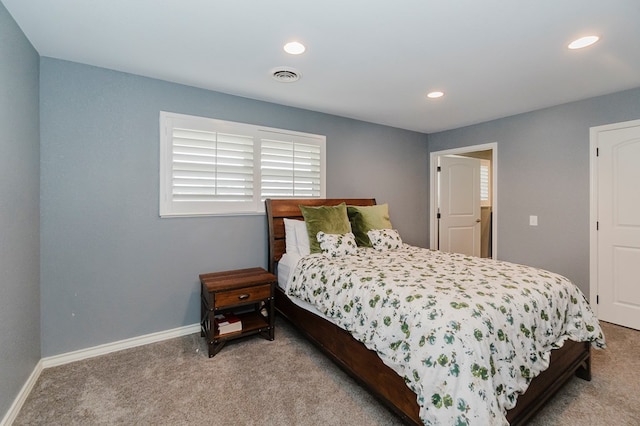 3300 Cambridge St, Odessa, TX 79761 - carpeted bedroom featuring baseboards and recessed lighting
