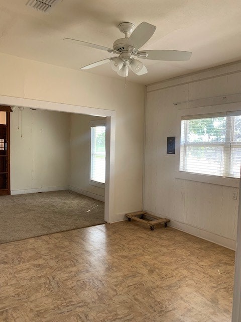 spare room featuring ceiling fan