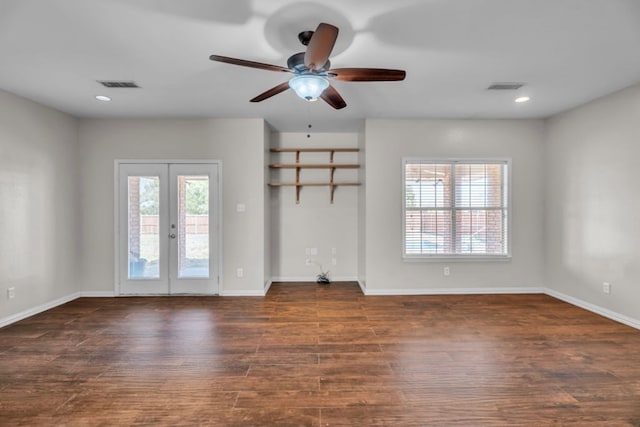 105 Maple Ave, Coahoma, TX 79720 - unfurnished living room with healthy amount of natural light, french doors, wood finished floors, and recessed lighting