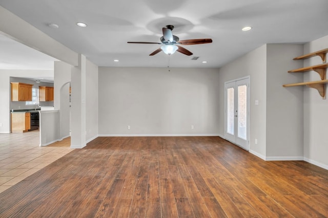 105 Maple Ave, Coahoma, TX 79720 - unfurnished living room featuring a ceiling fan, recessed lighting, wood finished floors, and baseboards