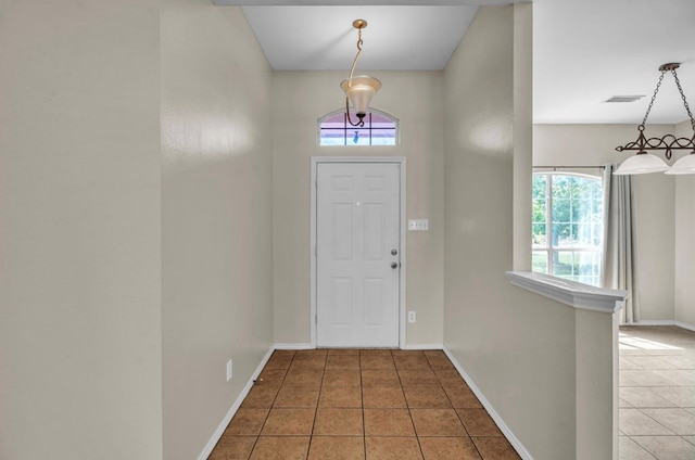 105 Maple Ave, Coahoma, TX 79720 - entrance foyer featuring tile patterned flooring and baseboards