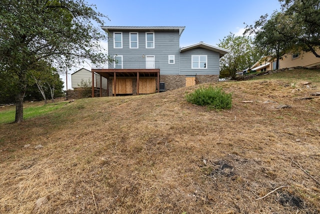 rear view of house with a deck