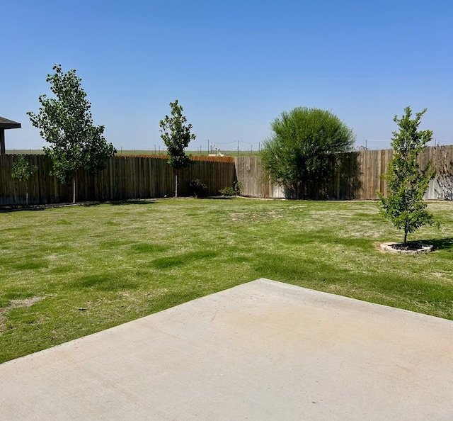 7103 Mcpherson Ln, Midland, TX 79706 - fenced backyard featuring a patio