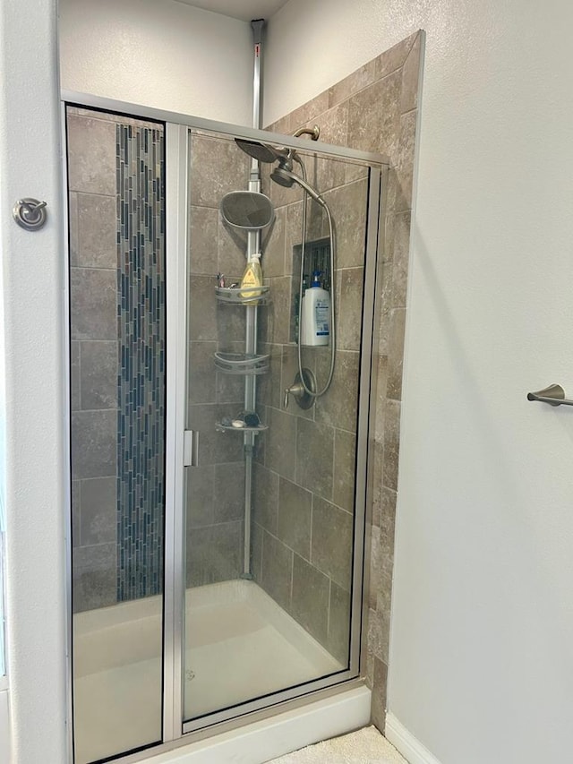 7103 Mcpherson Ln, Midland, TX 79706 - full bathroom featuring a shower stall