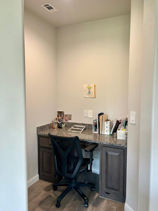 7103 Mcpherson Ln, Midland, TX 79706 - home office featuring wood finished floors and built in desk