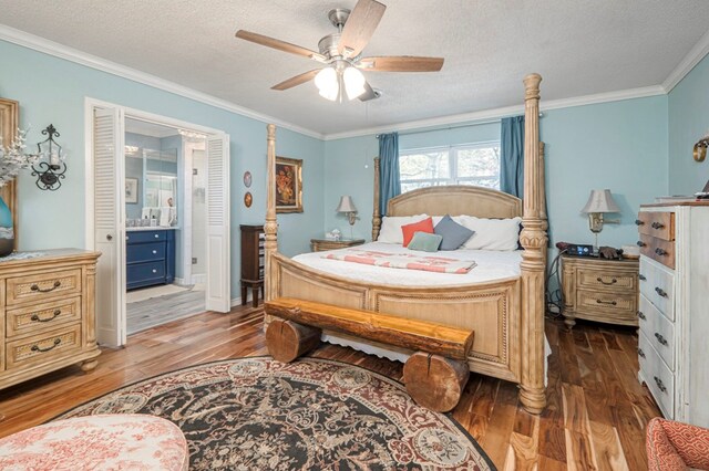 bedroom with ceiling fan, ensuite bathroom, crown molding, and a textured ceiling