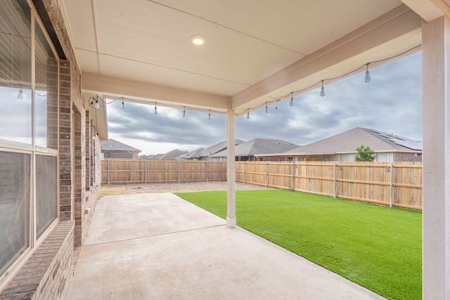 7318 Cross B Rd, Odessa, TX 79765 - fenced backyard featuring a patio