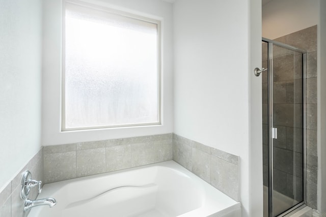 7318 Cross B Rd, Odessa, TX 79765 - bathroom with a stall shower and a garden tub