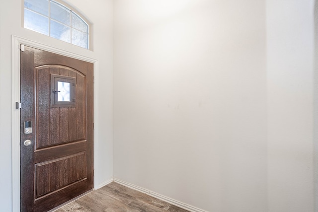 7318 Cross B Rd, Odessa, TX 79765 - entryway with baseboards and wood finished floors