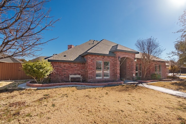 exterior space with a lawn