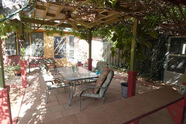 2511 Fontana St, Odessa, TX 79763 - view of patio with outdoor dining area, ceiling fan, and a pergola