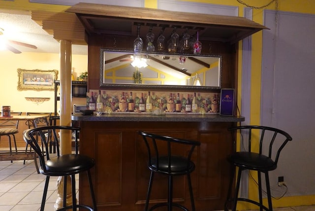 2511 Fontana St, Odessa, TX 79763 - indoor dry bar featuring a ceiling fan and light tile patterned floors