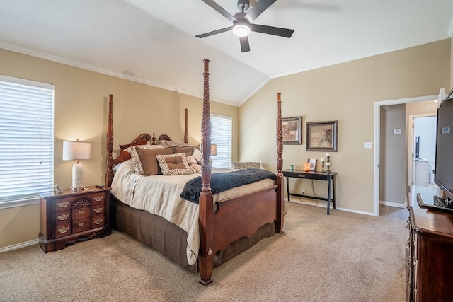 bedroom featuring light carpet, baseboards, lofted ceiling, and crown molding