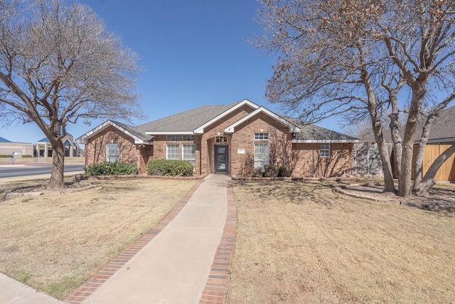 view of front of house with brick siding