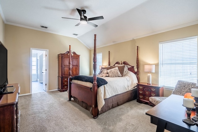 bedroom featuring lofted ceiling, visible vents, light colored carpet, and ornamental molding