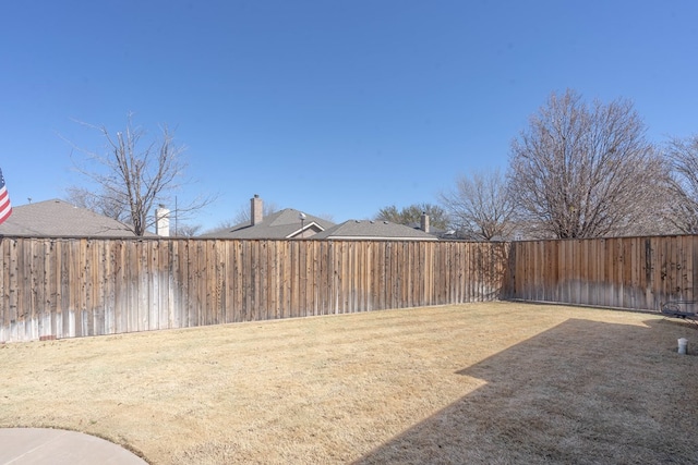 view of yard featuring a fenced backyard