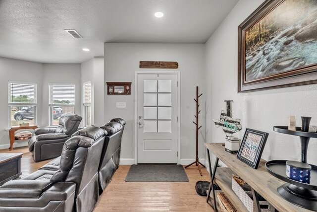 602 Frank Davis Ave, Coahoma, TX 79720 - entrance foyer with light wood finished floors, recessed lighting, and baseboards