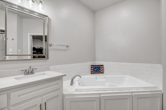 602 Frank Davis Ave, Coahoma, TX 79720 - bathroom featuring vanity and a garden tub