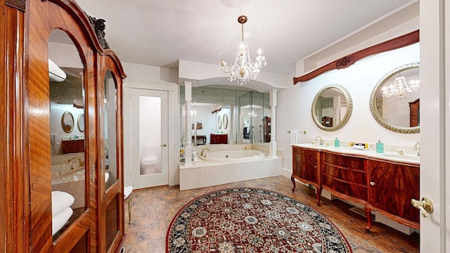 bathroom featuring tile patterned flooring, vanity, tiled tub, and a chandelier