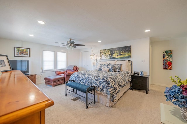 carpeted bedroom featuring ceiling fan