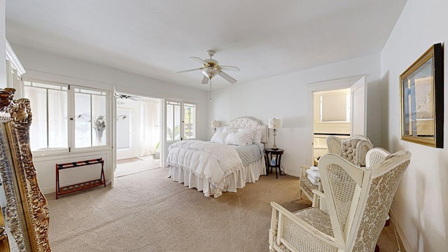 bedroom with ceiling fan and light colored carpet