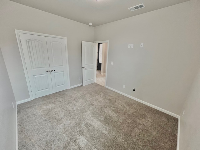 3108 Mearns Ct, Midland, TX 79705 - unfurnished bedroom featuring carpet, a closet, and baseboards