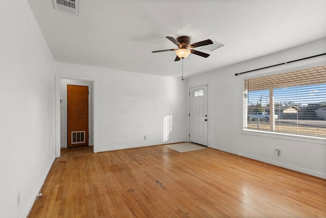 unfurnished room featuring light hardwood / wood-style flooring and ceiling fan