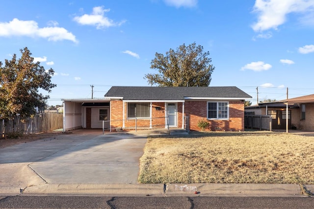 single story home with a carport