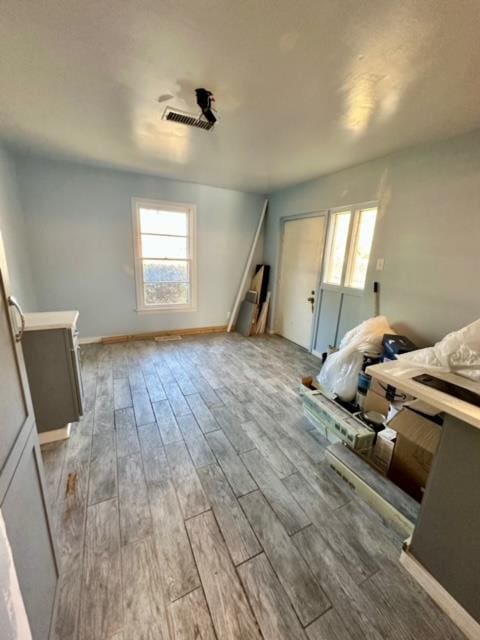 interior space with light hardwood / wood-style flooring