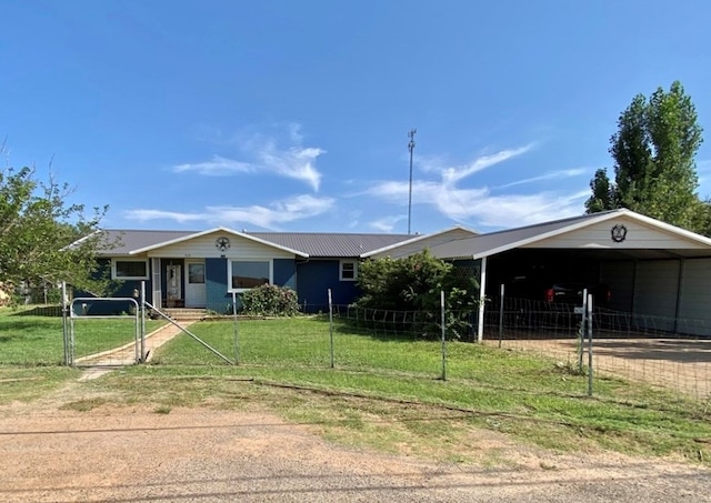 ranch-style house with a front yard and a carport