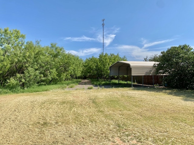 view of yard with a carport