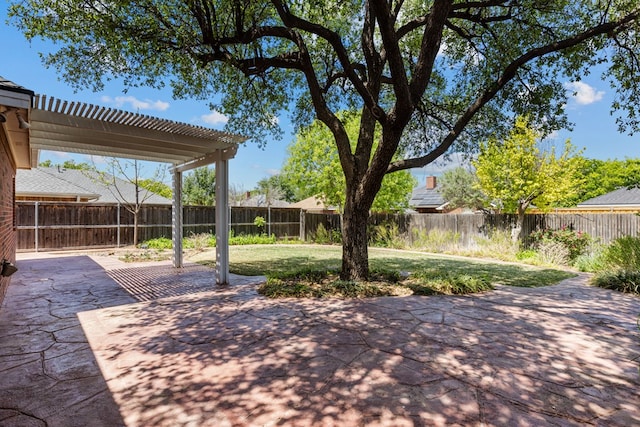 5708 Ridgemont Pl, Midland, TX 79707 - fenced backyard featuring a patio