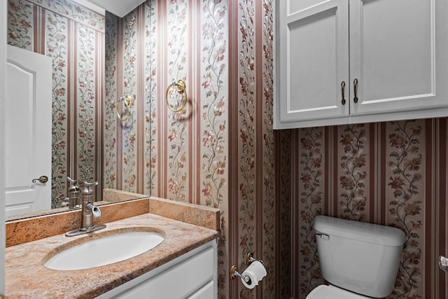 5708 Ridgemont Pl, Midland, TX 79707 - bathroom with vanity and wallpapered walls