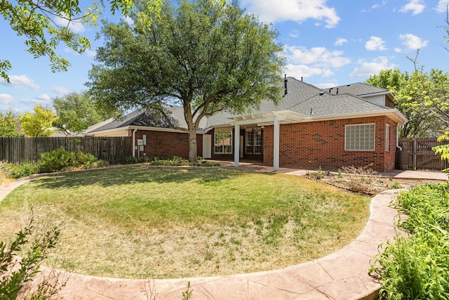 5708 Ridgemont Pl, Midland, TX 79707 - rear view of property featuring a pergola, brick siding, a fenced backyard, a patio area, and roof with shingles