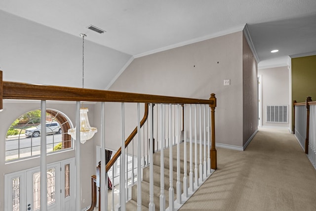 5708 Ridgemont Pl, Midland, TX 79707 - hallway featuring a chandelier, carpet flooring, ornamental molding, an upstairs landing, and high vaulted ceiling