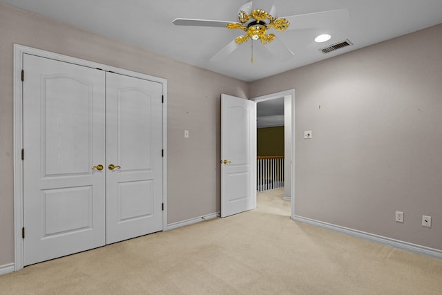 5708 Ridgemont Pl, Midland, TX 79707 - unfurnished bedroom featuring light colored carpet, a closet, and a ceiling fan