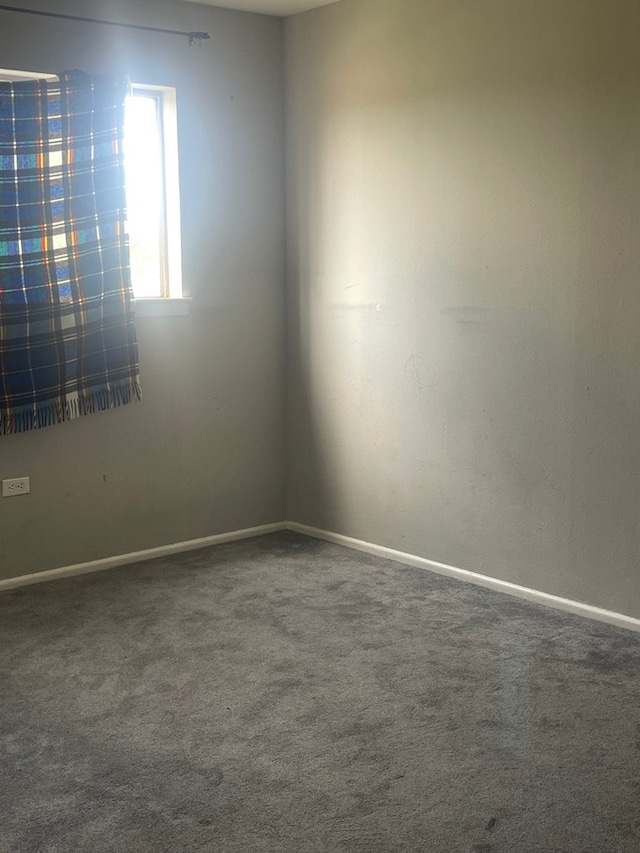 3000 W Illinois Ave Unit 24, Midland, TX 79701 - unfurnished room featuring carpet and baseboards