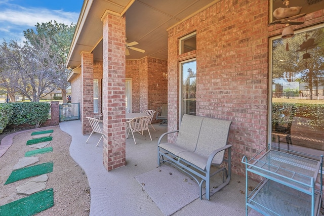 view of patio / terrace featuring ceiling fan