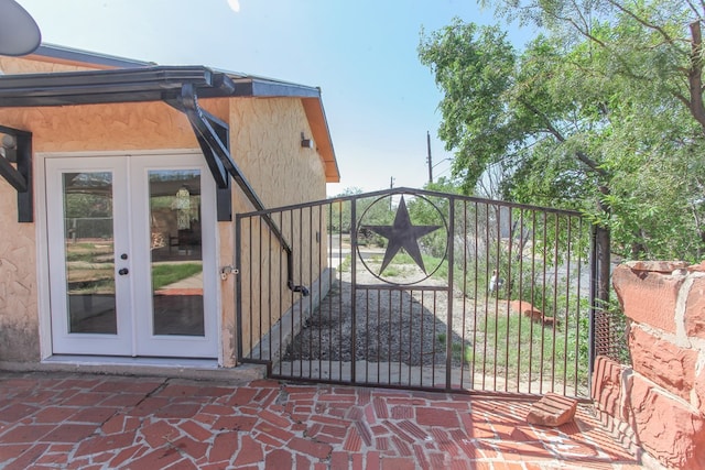 view of gate with french doors