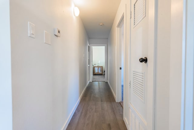 4604 Versailles Dr, Midland, TX 79703 - corridor featuring dark wood-type flooring and baseboards