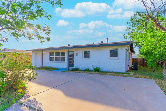 4604 Versailles Dr, Midland, TX 79703 - rear view of property with brick siding