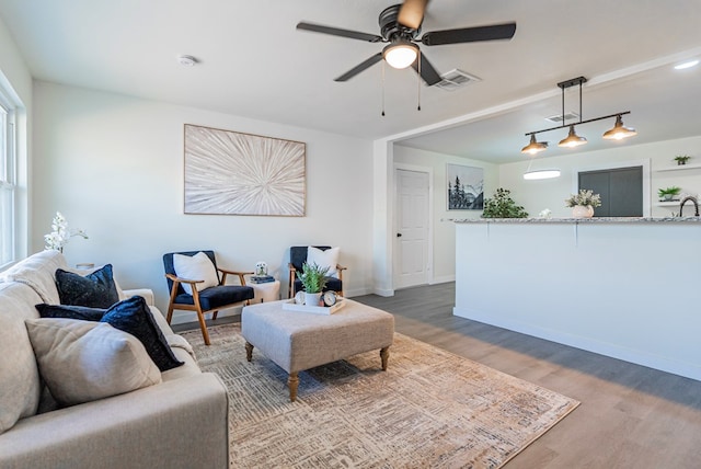 4604 Versailles Dr, Midland, TX 79703 - living area with wood finished floors and ceiling fan