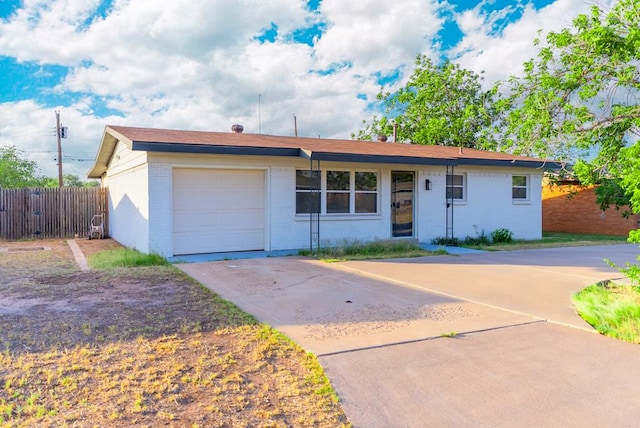4604 Versailles Dr, Midland, TX 79703 - single story home with brick siding, driveway, and a garage
