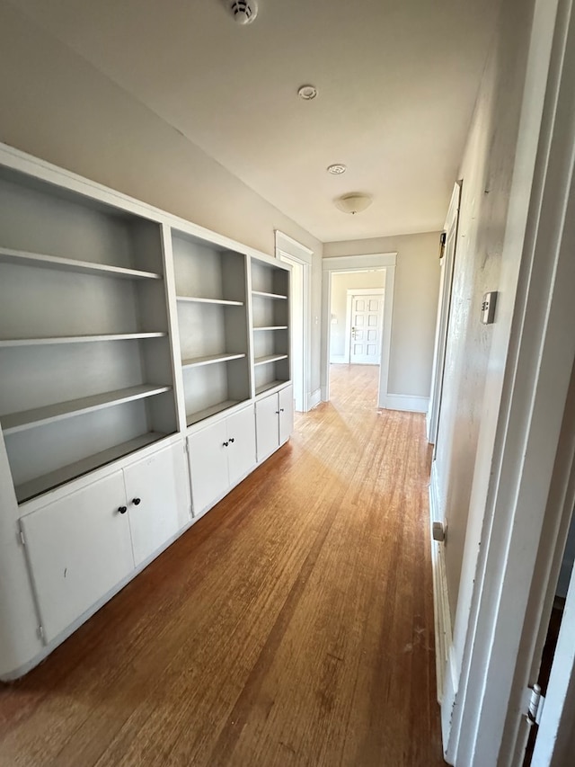 1912 29th St, Snyder, TX 79549 - corridor featuring hardwood / wood-style flooring