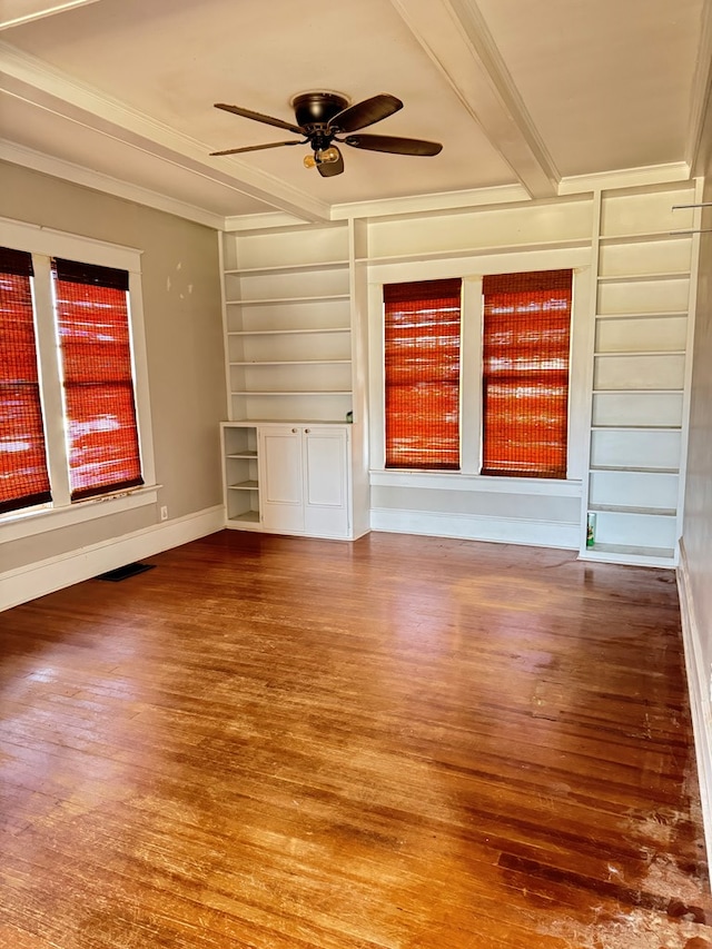 1912 29th St, Snyder, TX 79549 - unfurnished room with wood-type flooring, built in features, ceiling fan, and ornamental molding