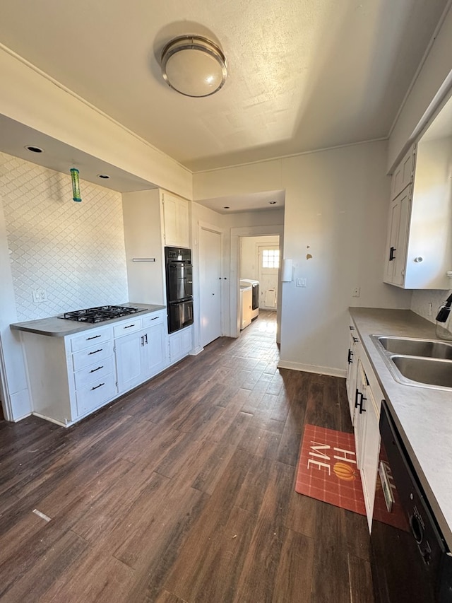 1912 29th St, Snyder, TX 79549 - kitchen featuring sink, white cabinets, stainless steel gas stovetop, and dishwasher