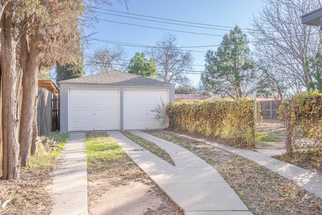 detached garage with fence