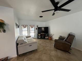 living room with a ceiling fan