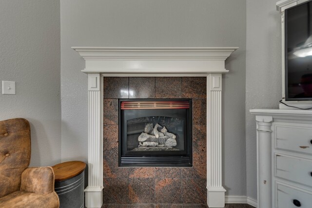 5709 E County Rd 97, Midland, TX 79706 - interior details with a tile fireplace