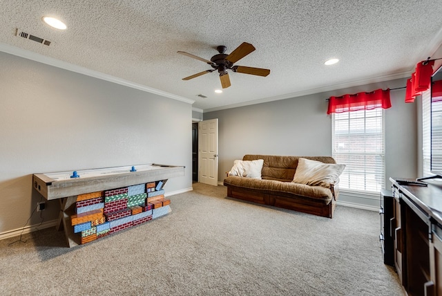 5709 E County Rd 97, Midland, TX 79706 - game room with a ceiling fan, ornamental molding, baseboards, and visible vents